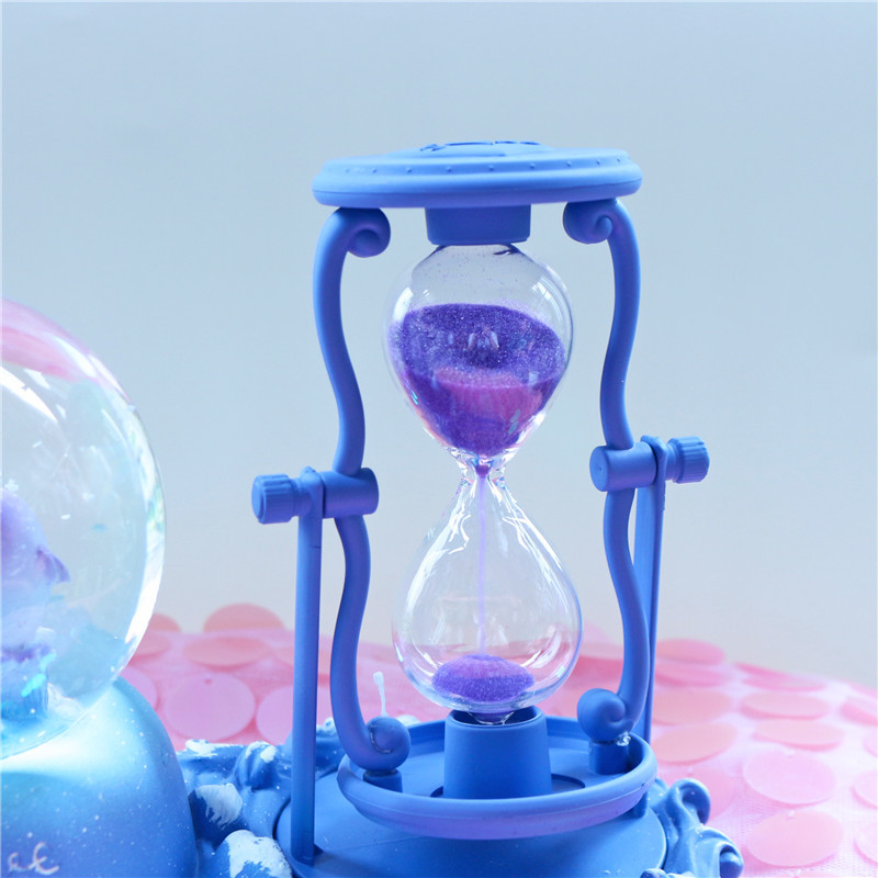 Dolphin Hourglass Timer Crysta - đánh giá và giá Snow Globe Musical